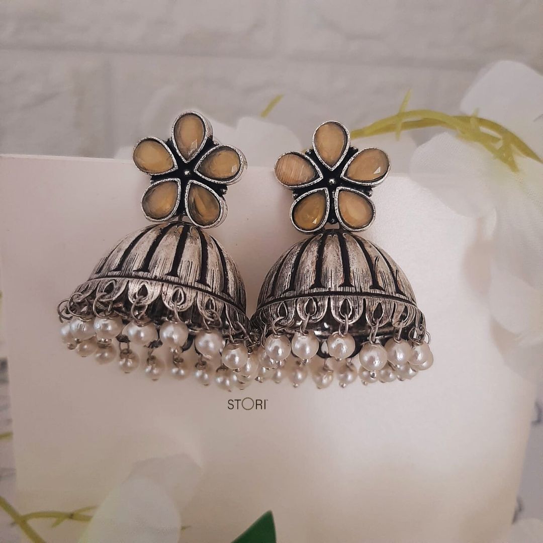 Athira Stone Studded Oxidised Jhumka Earrings