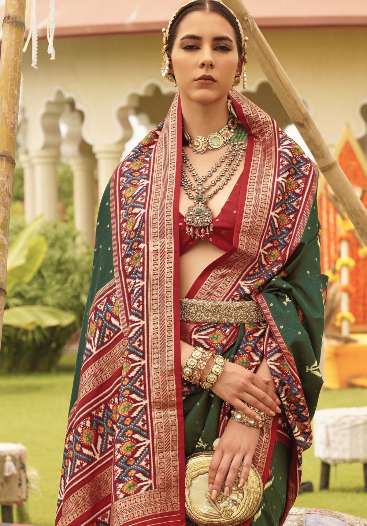Shop Dark Green Patola Silk Saree for Wedding at STORI