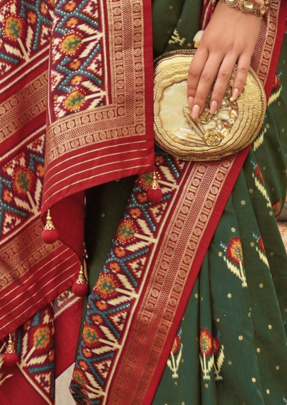 Shop Dark Green Patola Silk Saree for Wedding at STORI