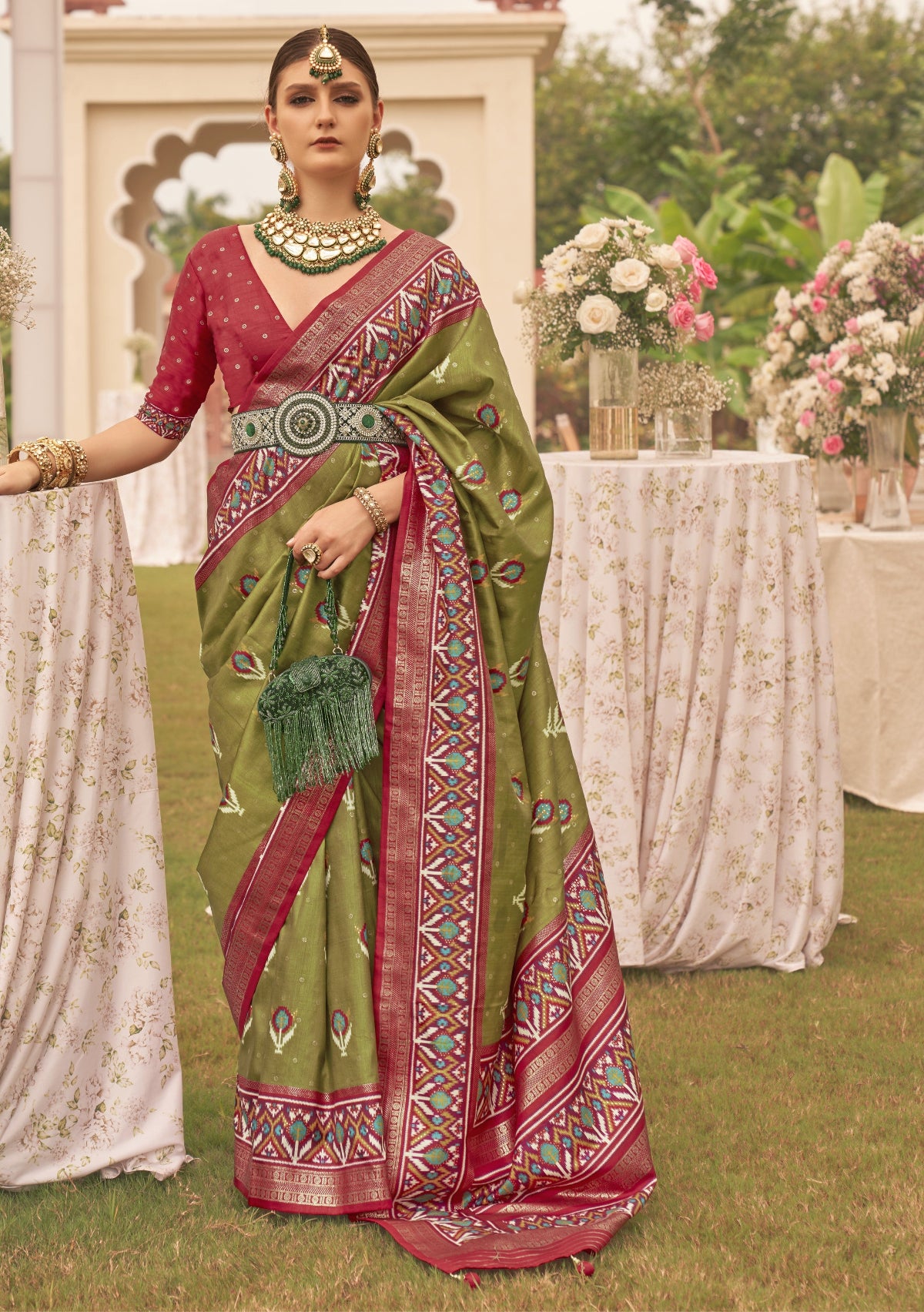 Shop Olive Green Patola Silk Saree for Wedding at STORI