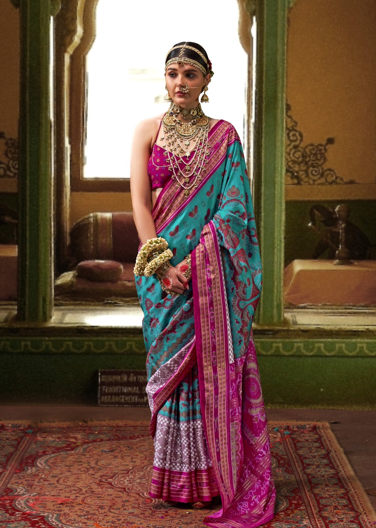 Best Teal Blue Patola Silk Saree Online in India