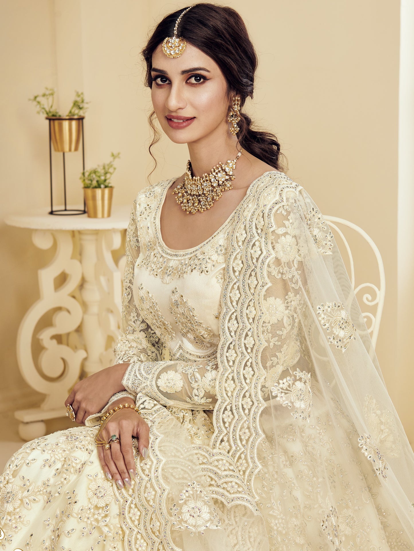 Ivory White Heavy Embroidered Net Lehenga