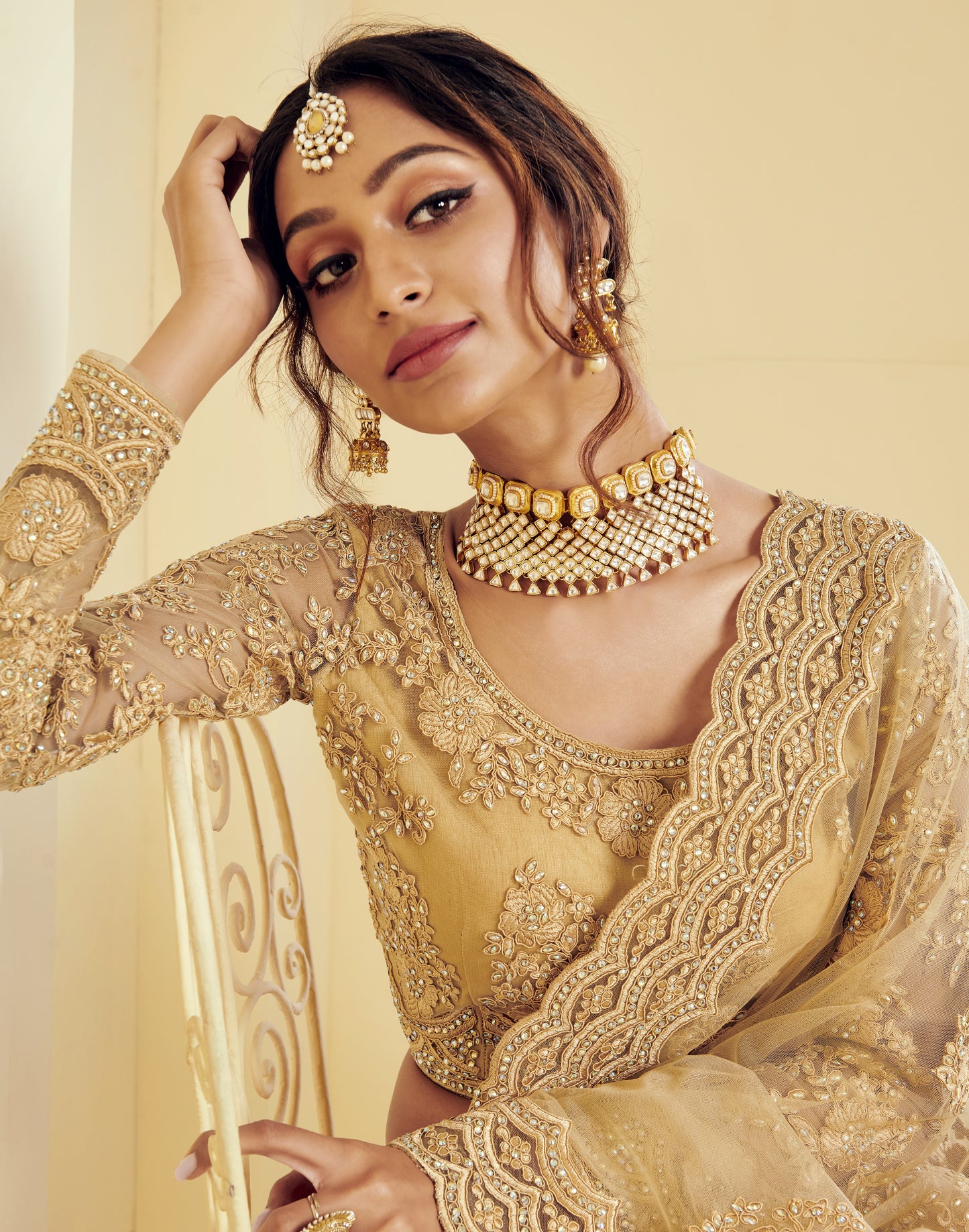 Golden Buff Heavy Embroidered Net Lehenga