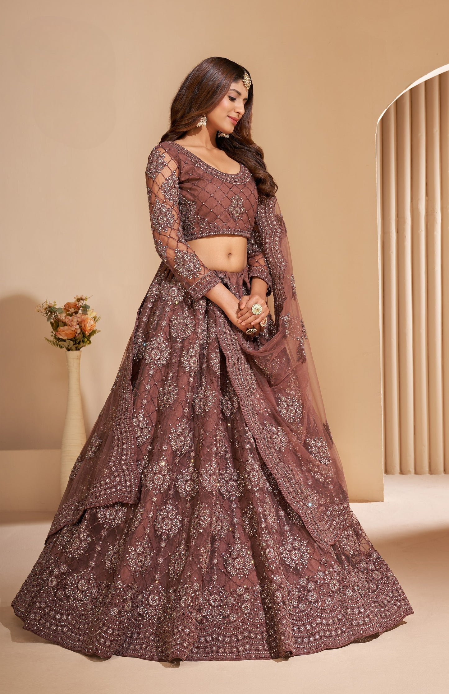 Cinnamon Brown Heavy Embroidered Net Lehenga