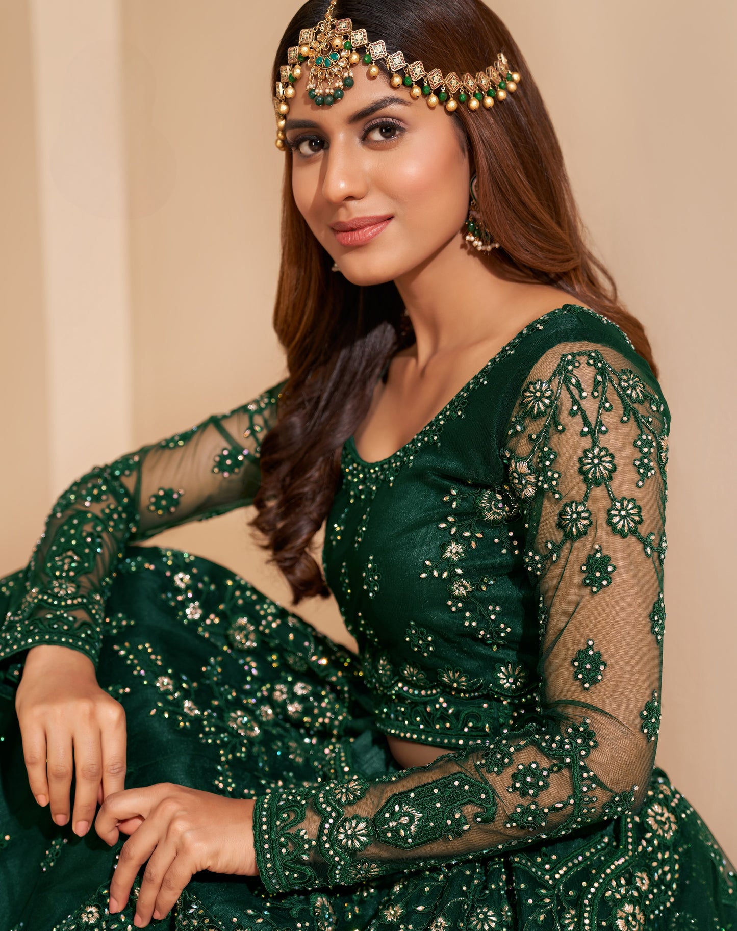 Pine Green Heavy Embroidered Net Lehenga