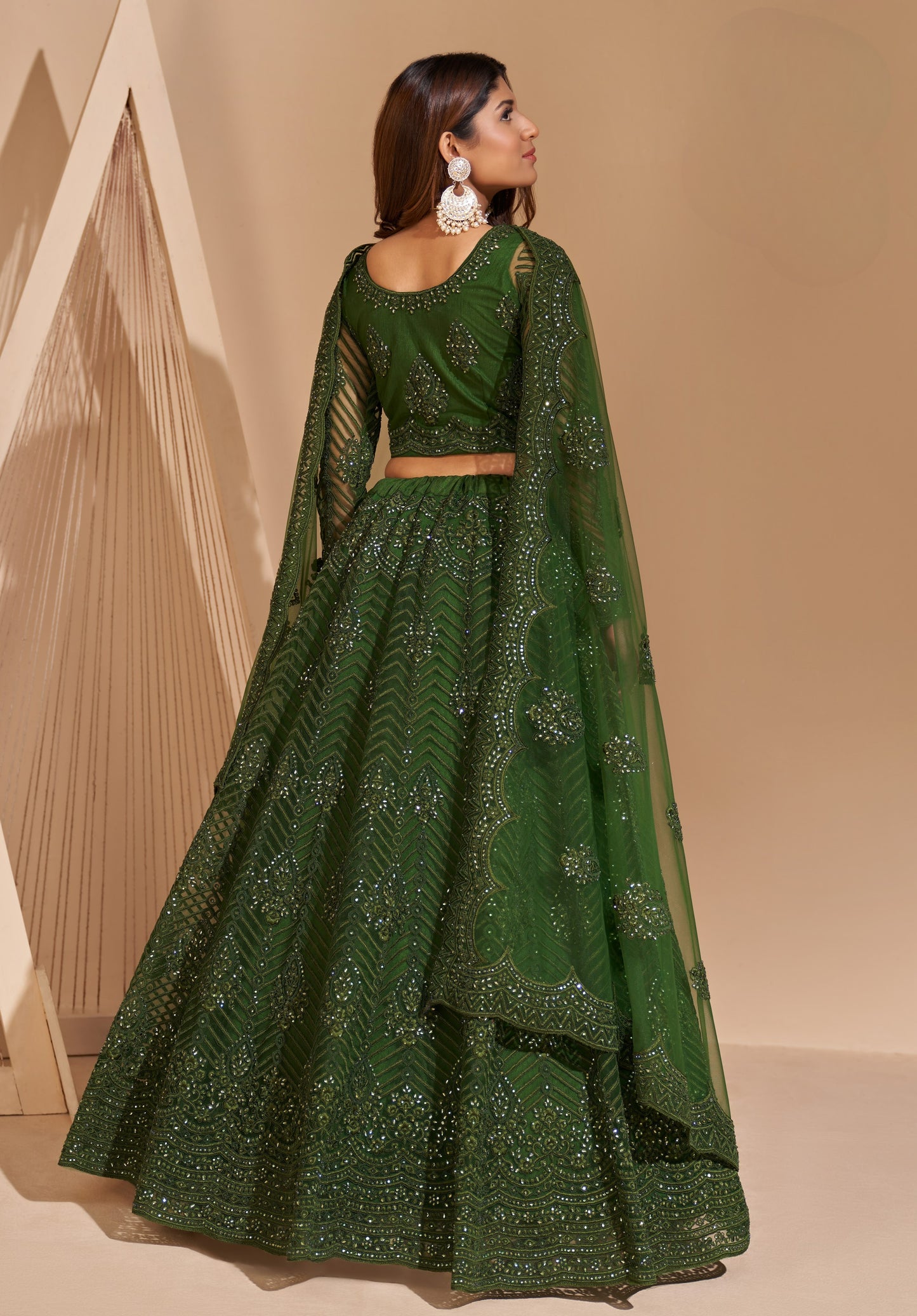 Mehendi Green Heavy Embroidered Net Lehenga