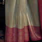 Olive Green Zari Tissue Silk Saree With Temple Border