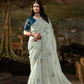 Pastel Mint Green Tissue Silk Saree With Embroidered Designer Blouse