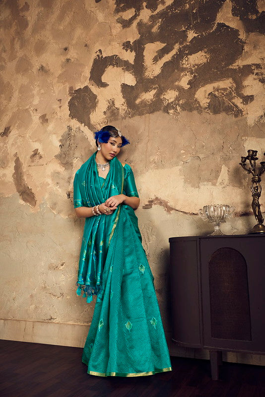 Teal Green Silk Saree With Patola Motifs