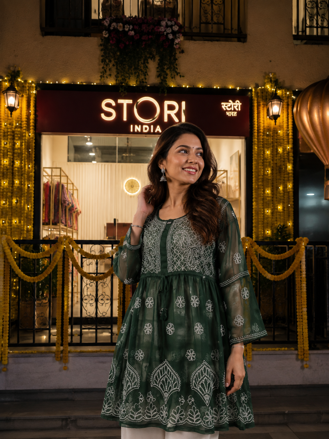 Adila Pine Green Short Georgette Chikankari Kurti With Bell Sleev