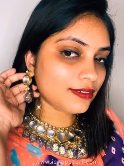 Purple kundan necklace set in a grape-inspired shade with earrings.