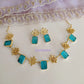 Single-layer green necklace set with a minimalist touch.
