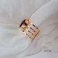 Green Oval Stone Golden Stripes Finger Ring