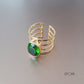 Green Oval Stone Golden Stripes Finger Ring
