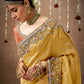 Shop Yellow Banarasi Sarees online at STORI