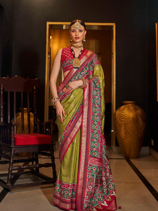 Shop Olive Green Patola Silk Saree for Wedding at STORI