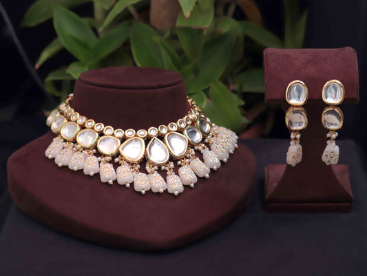Pearl Tanjore kundan necklace set for elegant styling.