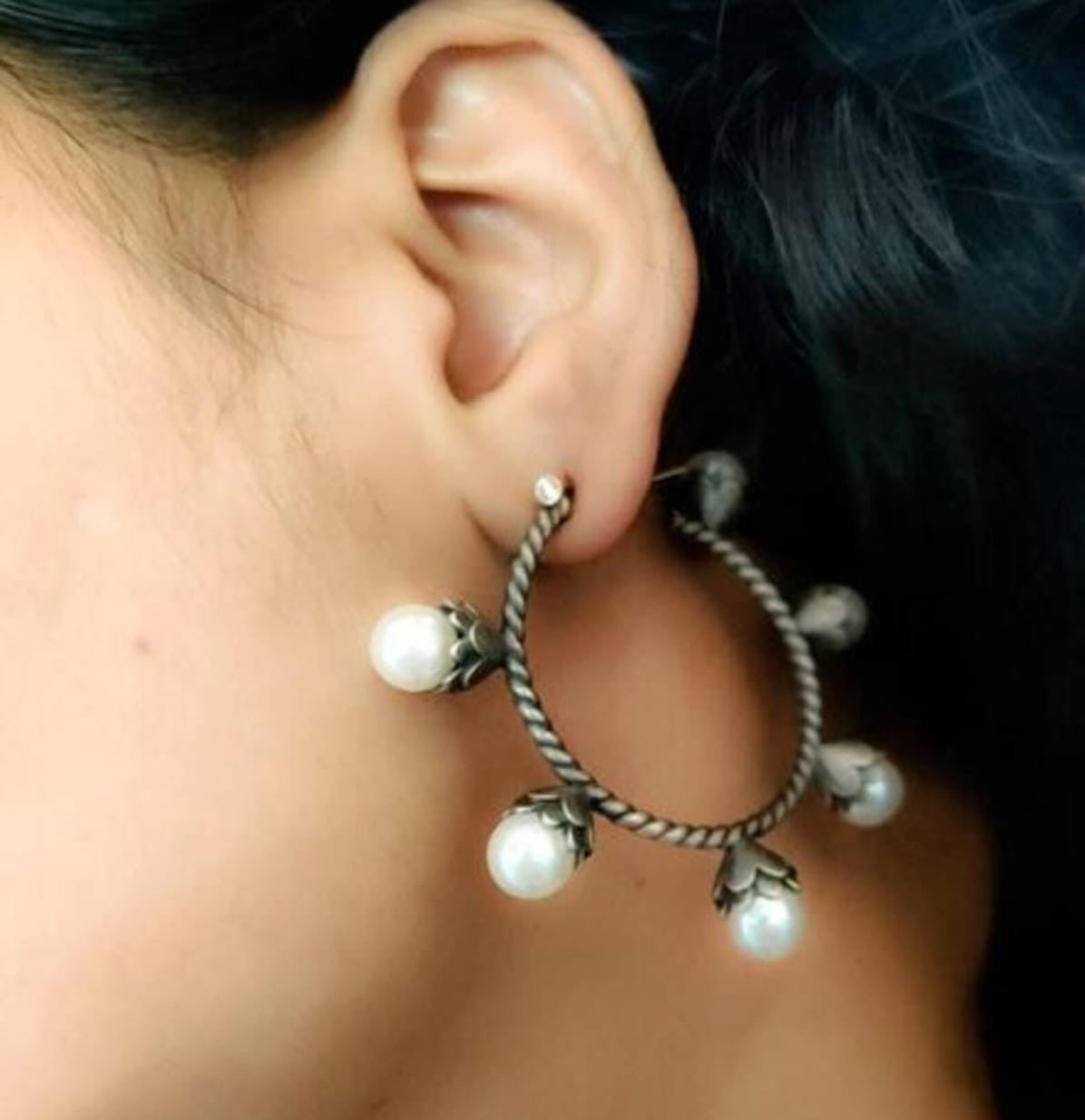 Kalika Curved Buds Silver Look Alike Earrings