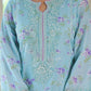 Light blue embroidered dress with floral patterns