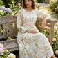 white and yellow flower print kurti