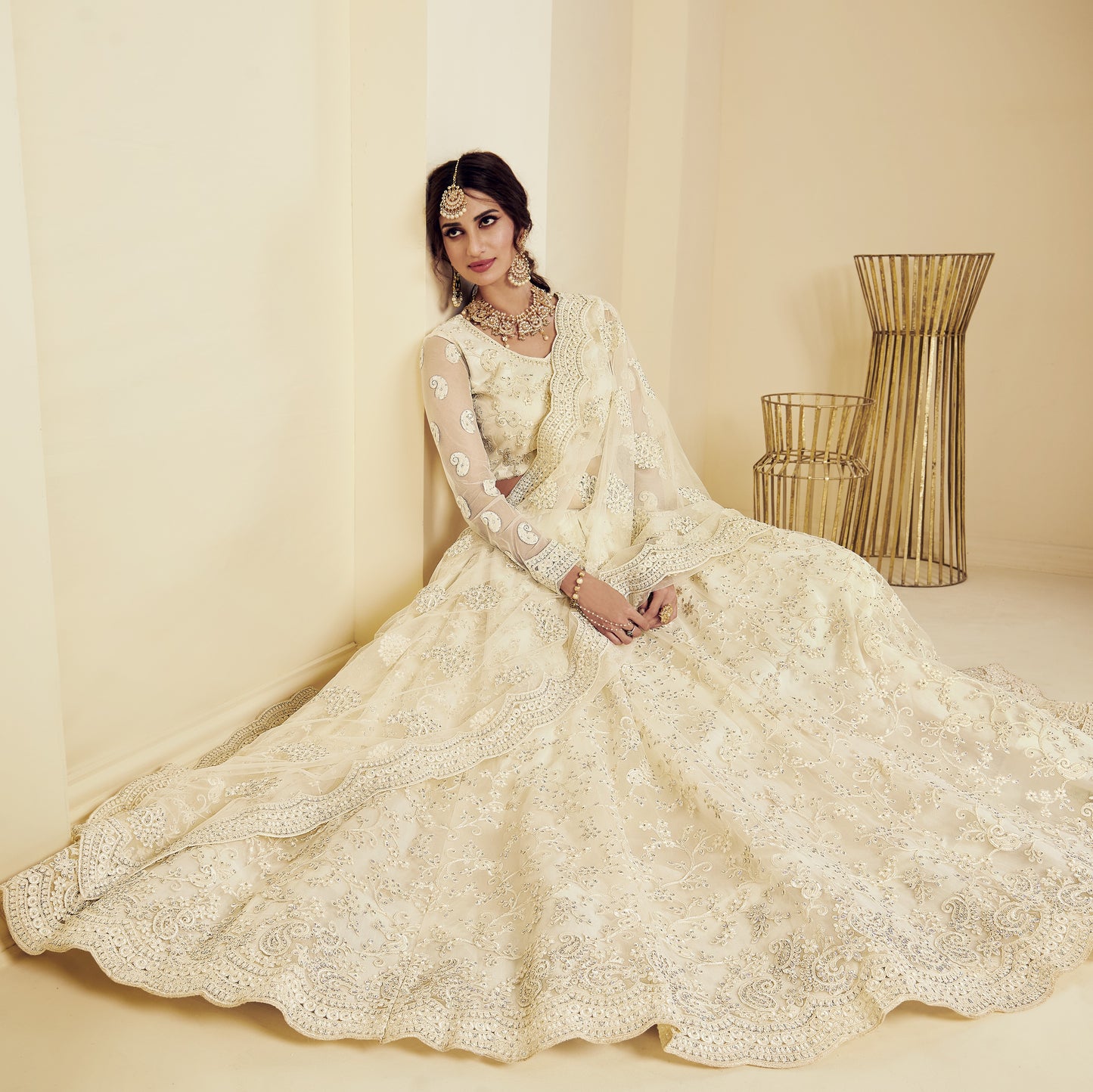 Ivory White Heavy Embroidered Net Lehenga