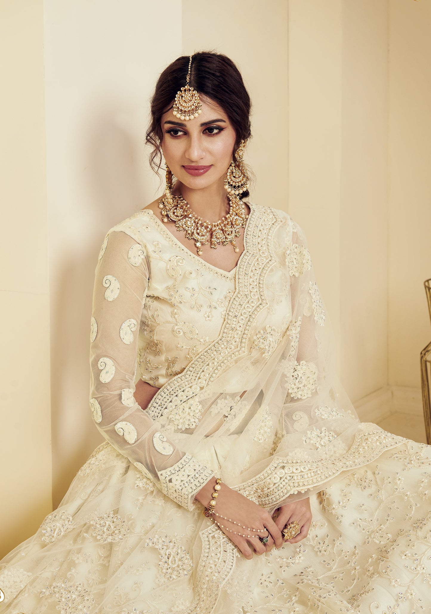 Ivory White Heavy Embroidered Net Lehenga