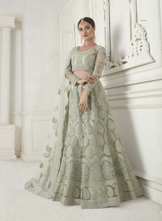 Pista Green Heavy Embroidered Net Lehenga