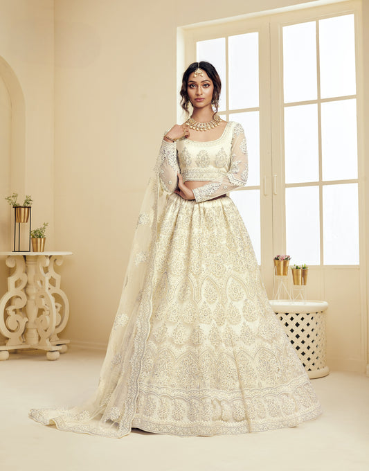 Off White Heavy Embroidered Net Lehenga