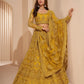 Turmeric Yellow Heavy Embroidered Net Lehenga