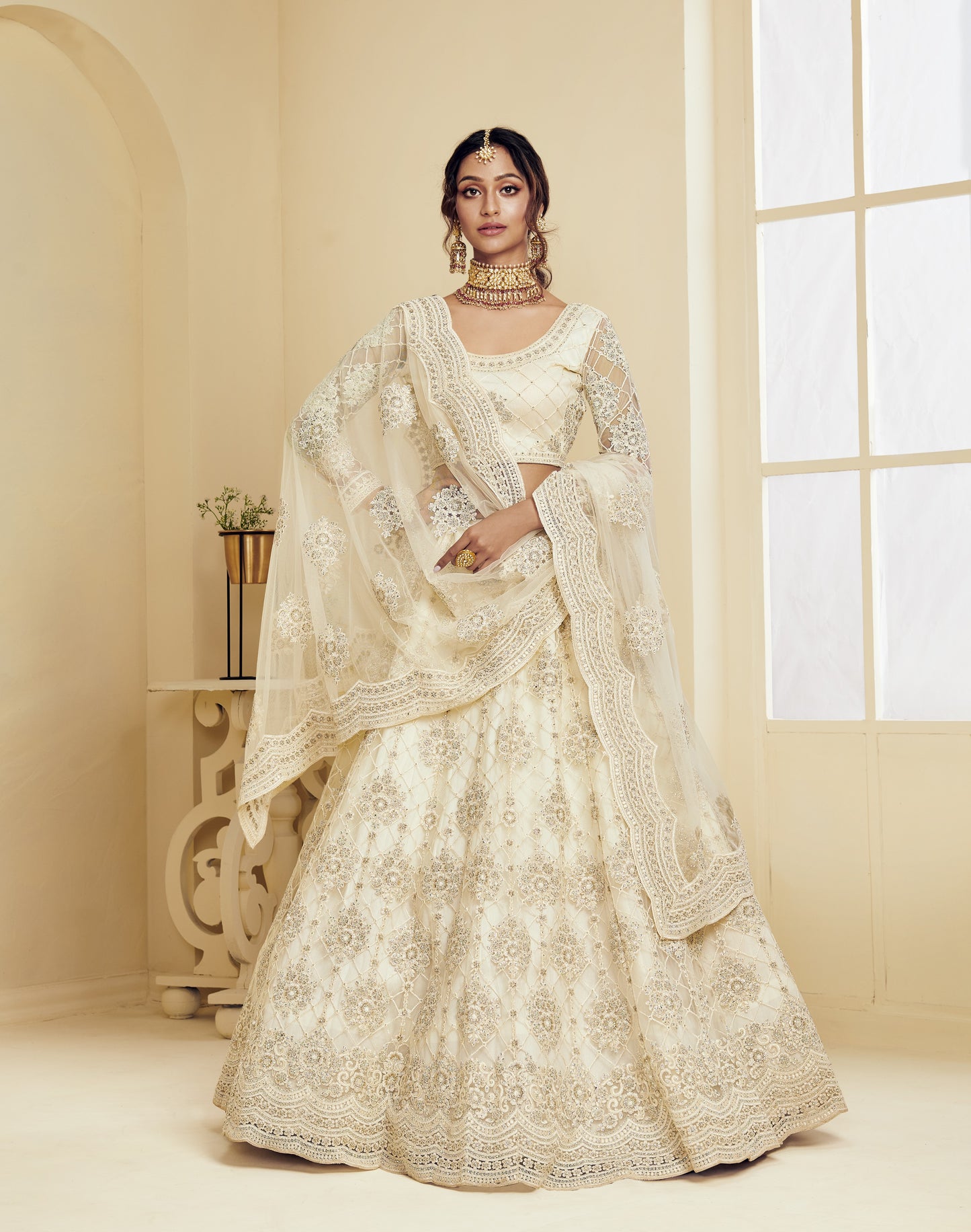 Cream White Heavy Embroidered Net Lehenga