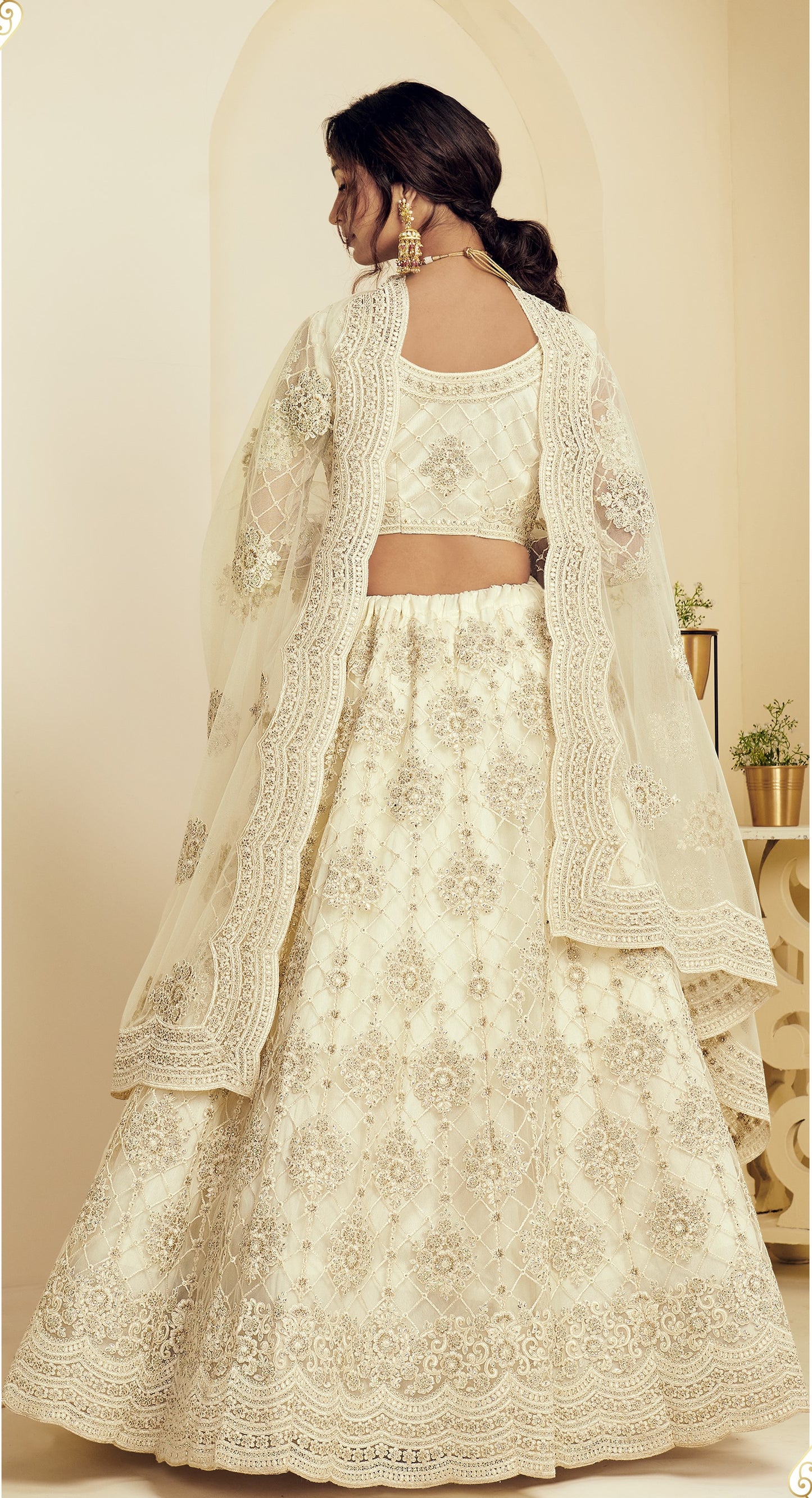 Cream White Heavy Embroidered Net Lehenga