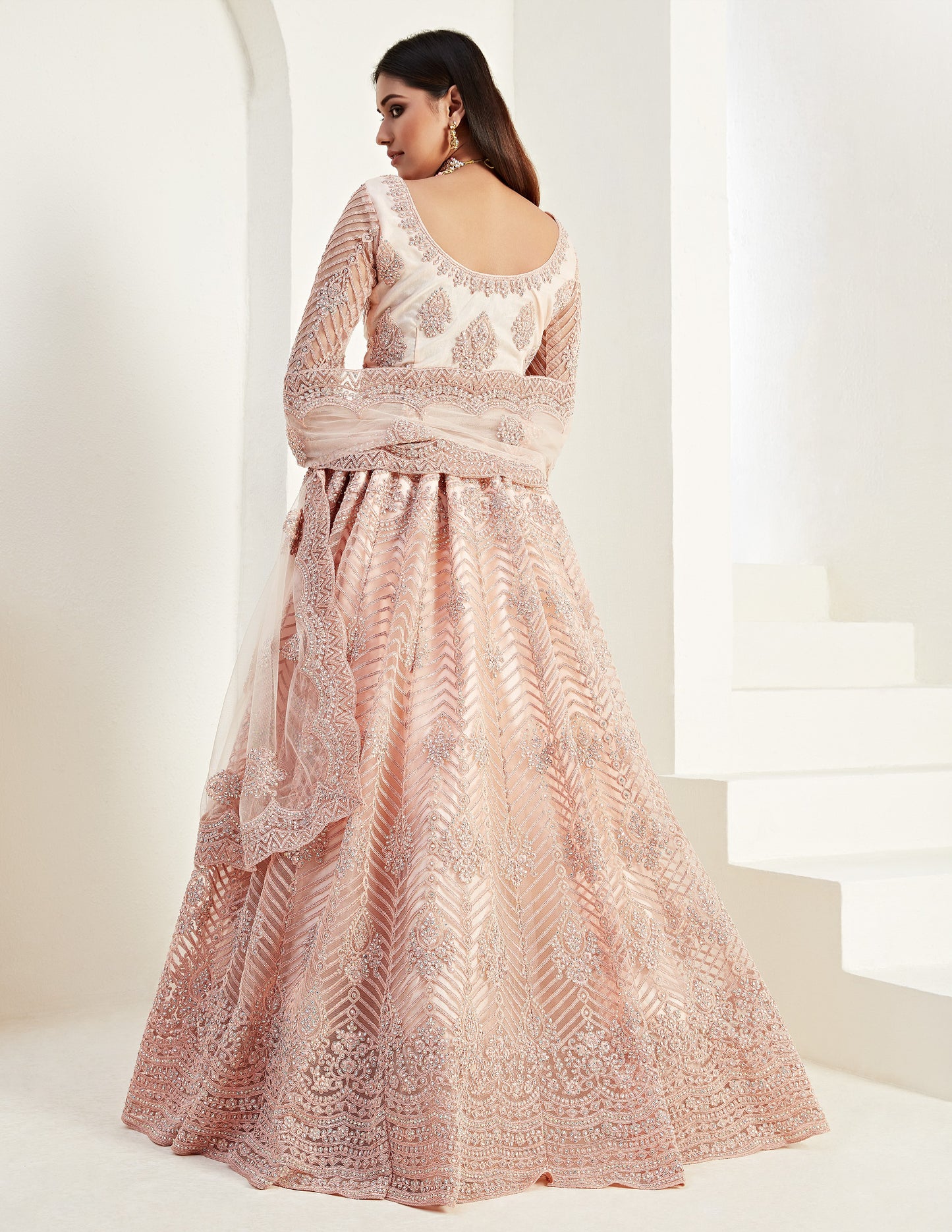 Apricot Peach Heavy Embroidered Net Bridal Lehenga