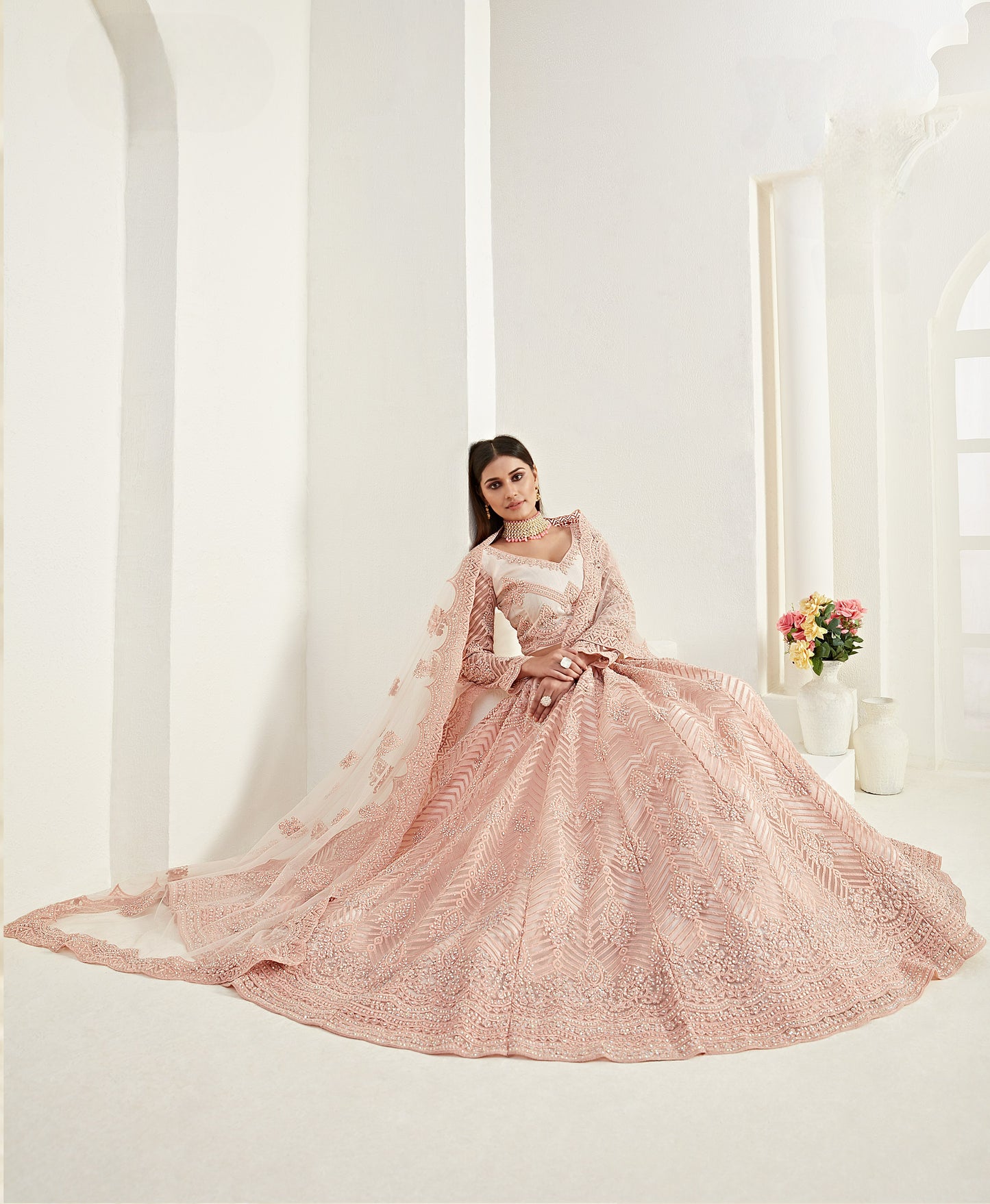 Apricot Peach Heavy Embroidered Net Bridal Lehenga