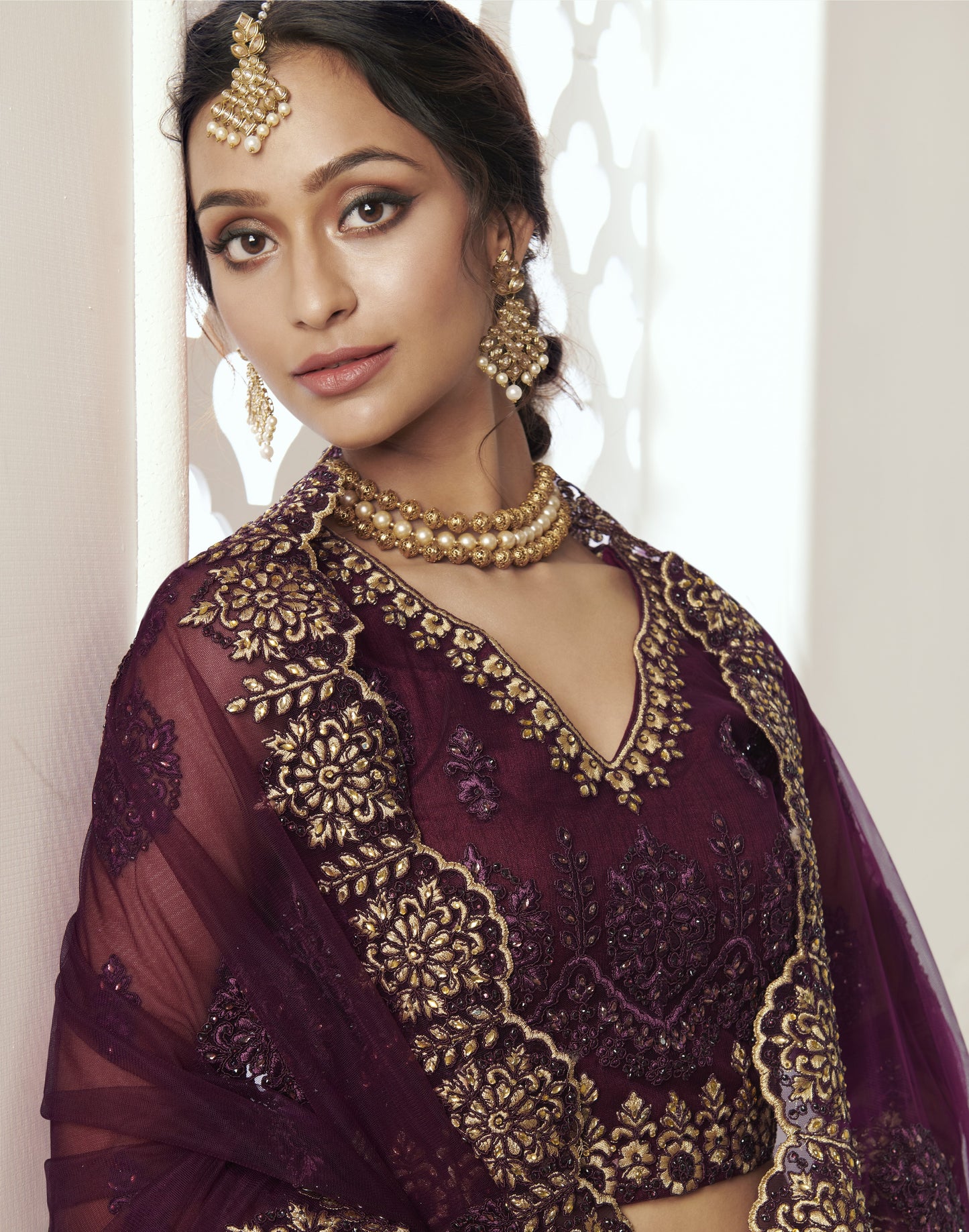 Grape Wine Heavy Embroidered Net Bridal Lehenga
