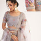 Dusky Lavendar Heavy Embroidered Net Bridal Lehenga