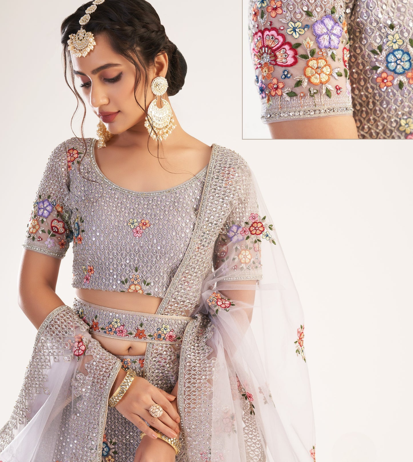 Dusky Lavendar Heavy Embroidered Net Bridal Lehenga