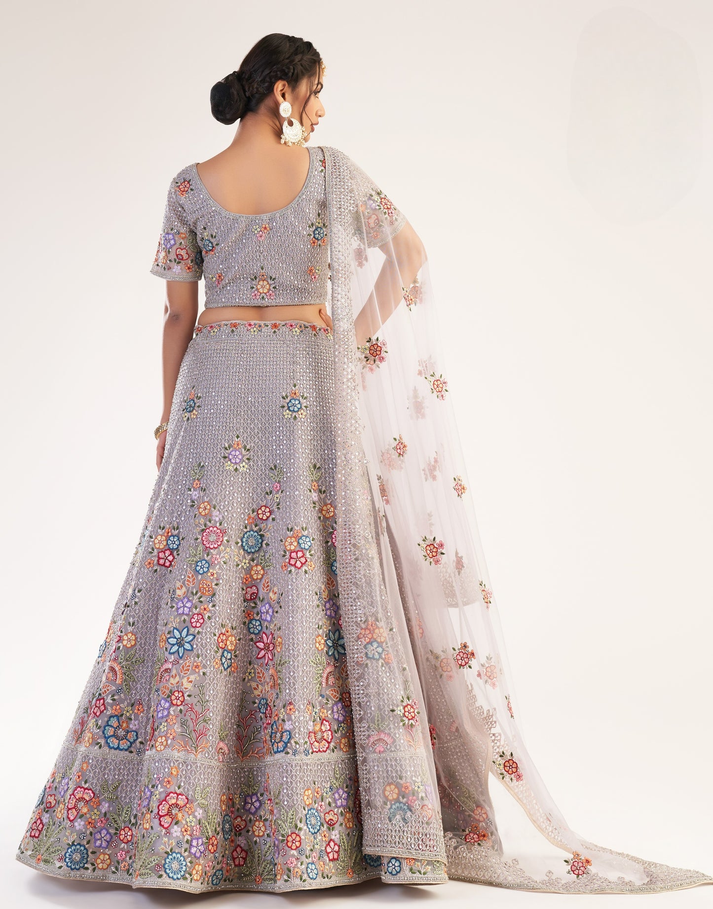 Dusky Lavendar Heavy Embroidered Net Bridal Lehenga