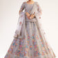 Dusky Lavendar Heavy Embroidered Net Bridal Lehenga