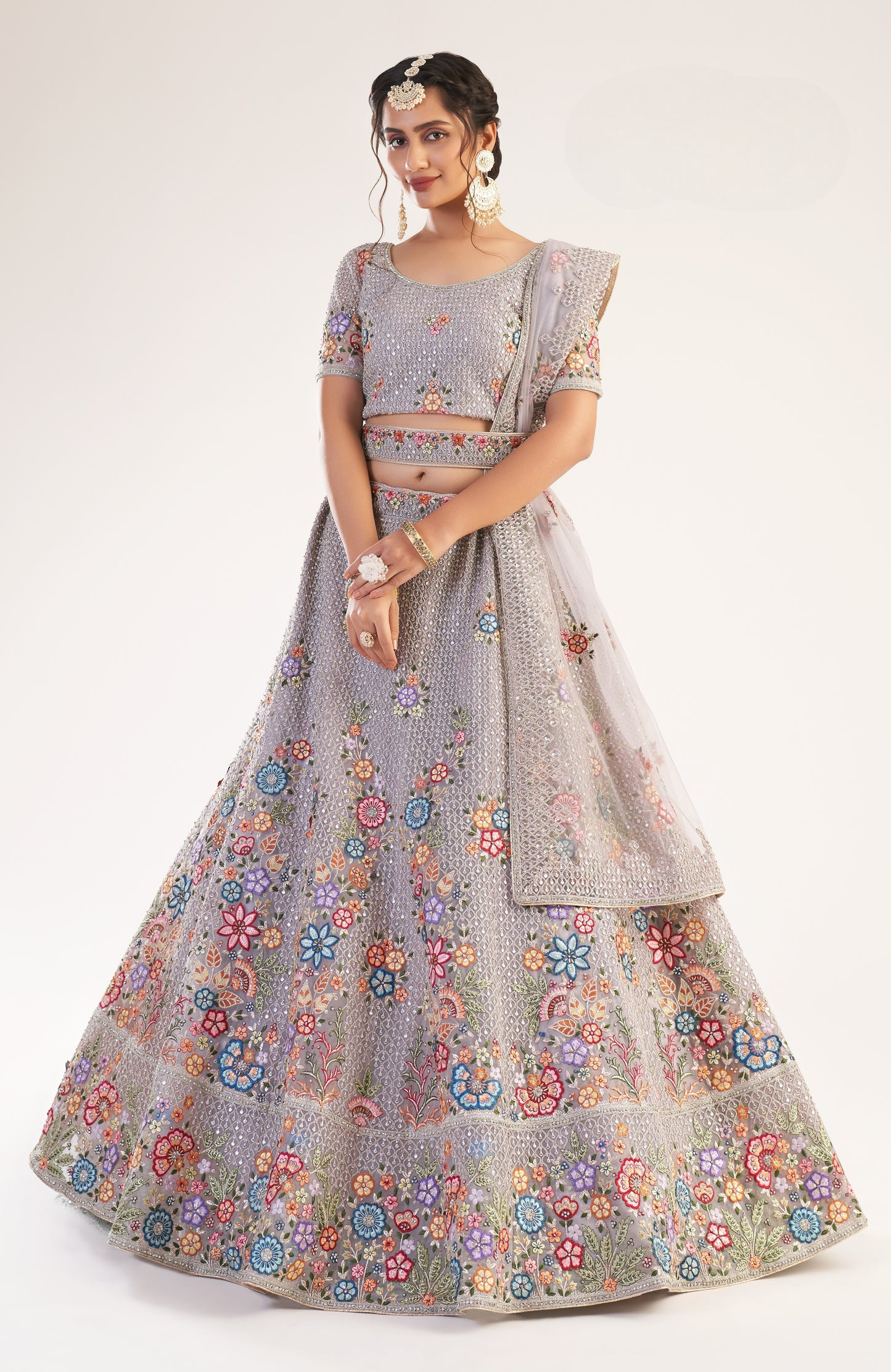 Dusky Lavendar Heavy Embroidered Net Bridal Lehenga