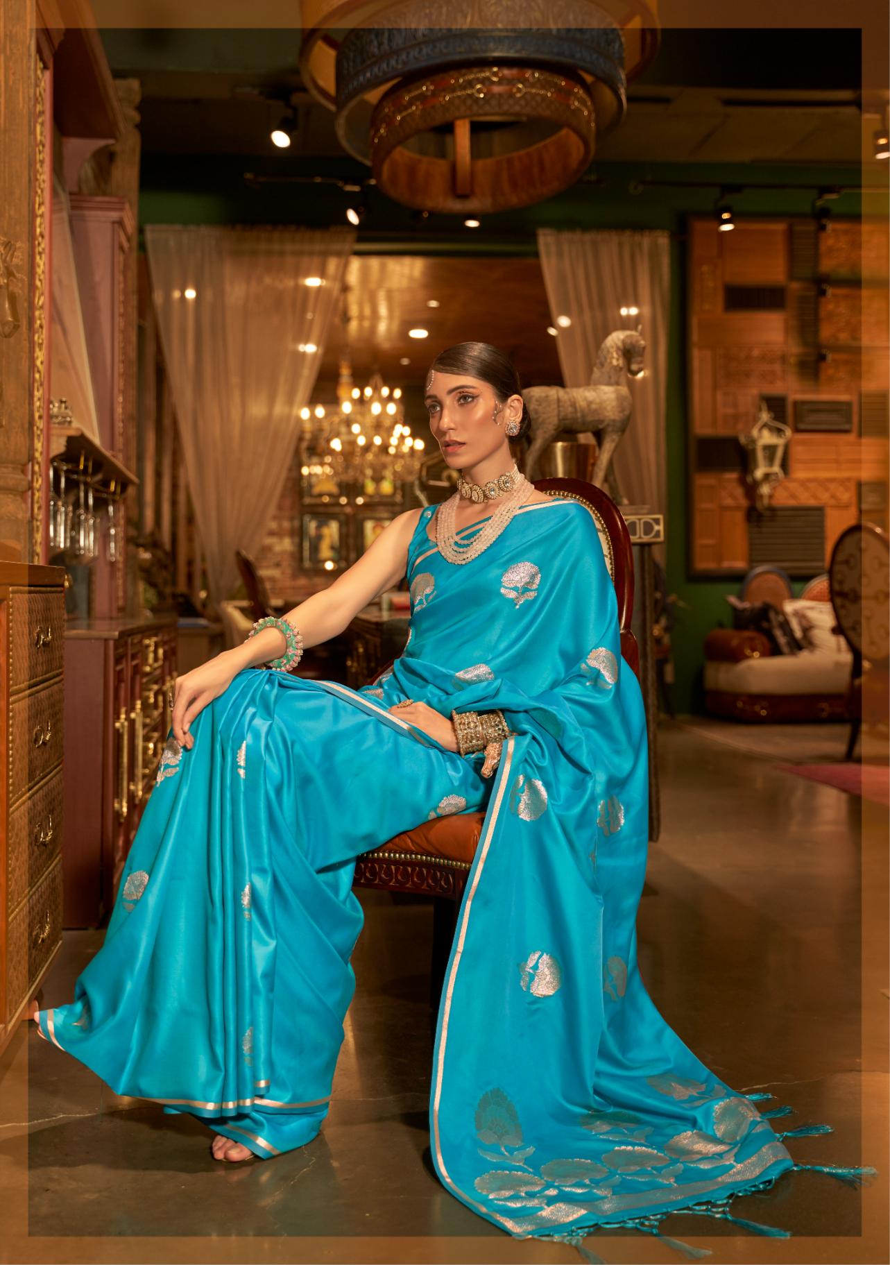 Cerulean Blue Satin Silk Saree With Carnation Dual Zari Motifs