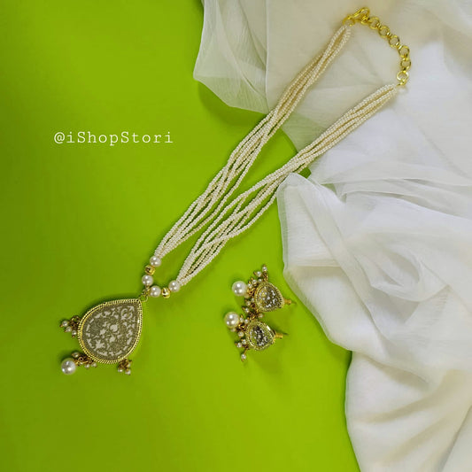 Rajasthani Tear Drop Thewa pendant necklace in an elegant style.