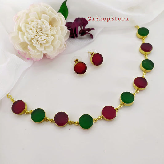 Premium ruby necklace set with raw stone detailing.