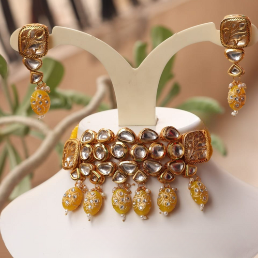 Brihan Yellow Tanjore Tumbles & Kundan Layered Choker Set