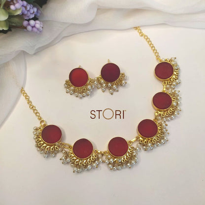Single color raw stones and pearls stone necklace in elegant design in red color.
