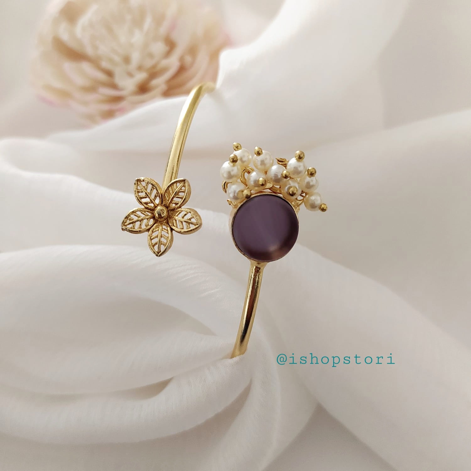A sleek Cartier bracelet with a classic, polished design, symbolizing luxury and elegance.