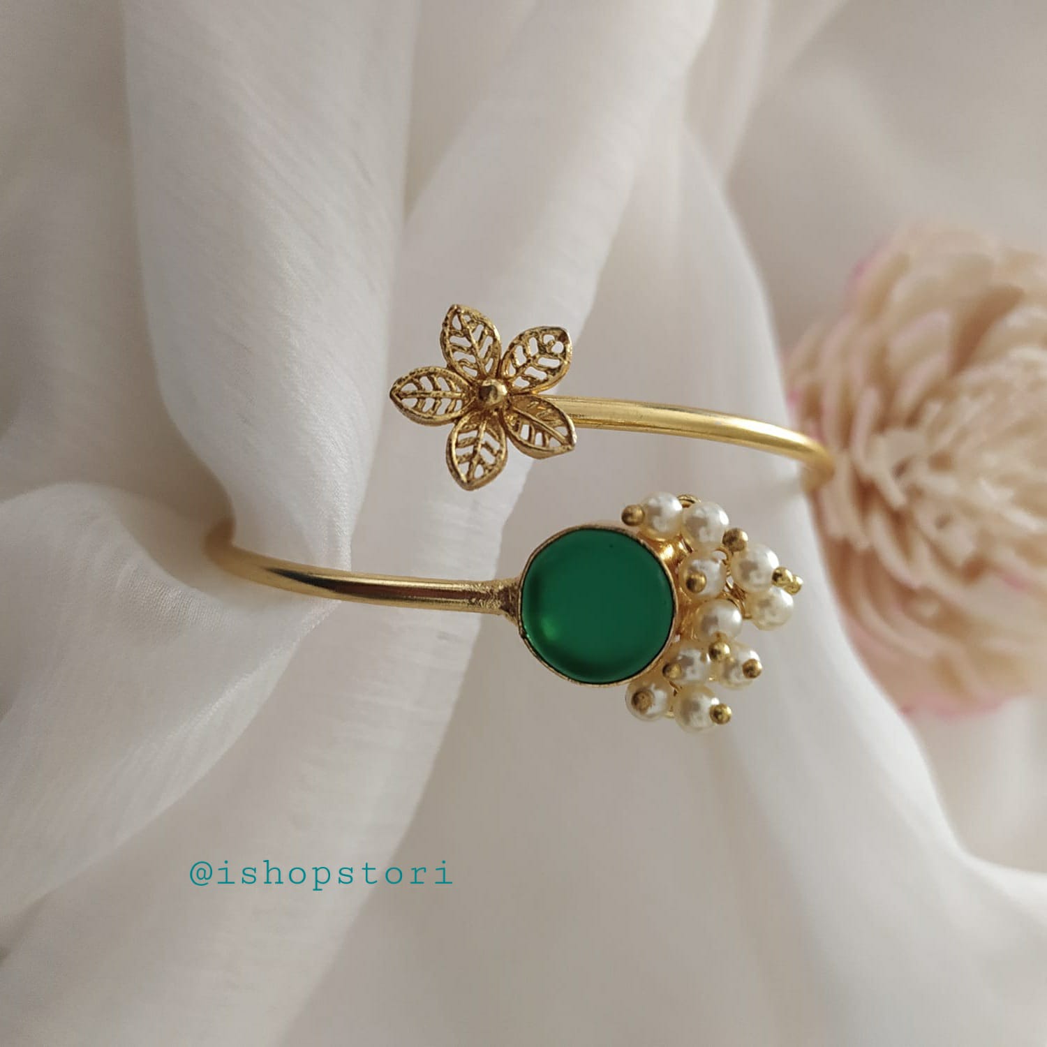 A sleek Cartier bracelet with a classic, polished design, symbolizing luxury and elegance.