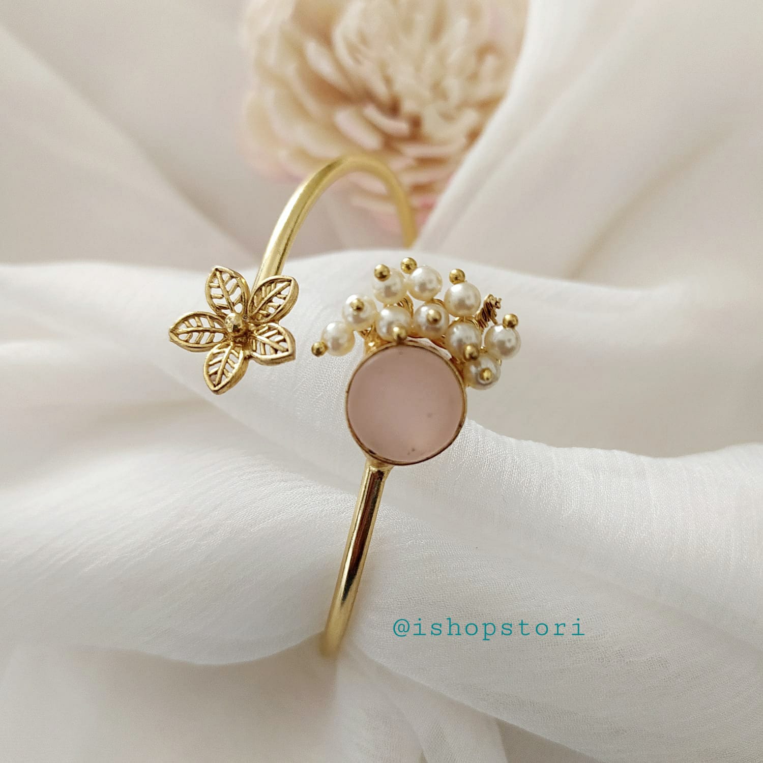 A sleek Cartier bracelet with a classic, polished design, symbolizing luxury and elegance.