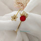 A sleek Cartier bracelet with a classic, polished design, symbolizing luxury and elegance.