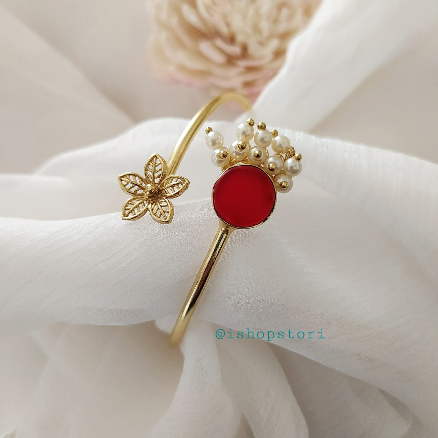 A sleek Cartier bracelet with a classic, polished design, symbolizing luxury and elegance.